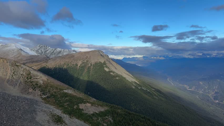 Town of Jasper in Canadian Rockies from Skytram. Pyramid Mountain, Pyramid Lake, Mount Robson, Miette Mountain Ranges, Jasper Park Lodge and VIA Rail Jasper train