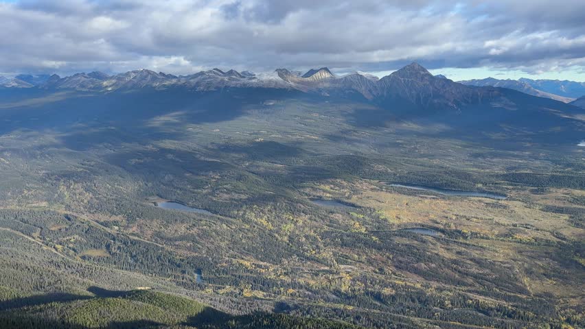Town of Jasper in Canadian Rockies from Skytram. Pyramid Mountain, Pyramid Lake, Mount Robson, Miette Mountain Ranges, Jasper Park Lodge and VIA Rail Jasper train
