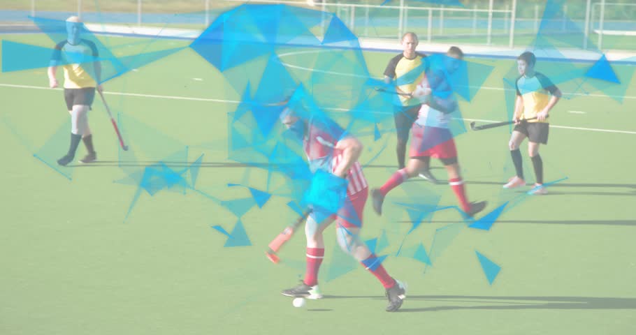 Hockey player receiving ball dribbling evading defenders until yellow defender intercepting ball. Athletic, team, competition, outdoor, dynamic, agility, sport