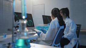 Female scientist analyzing intricate dna structure on advanced computer screen, showcasing cutting edge genetic research in modern laboratory workspace - Powered by Shutterstock - Get 15% off with code: PIKWIZARD15