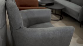 Soft, inviting chairs are arranged in a warm lounge space, providing a perfect spot for reading, chatting, or enjoying a quiet moment with a drink. - Powered by Shutterstock - Get 15% off with code: PIKWIZARD15