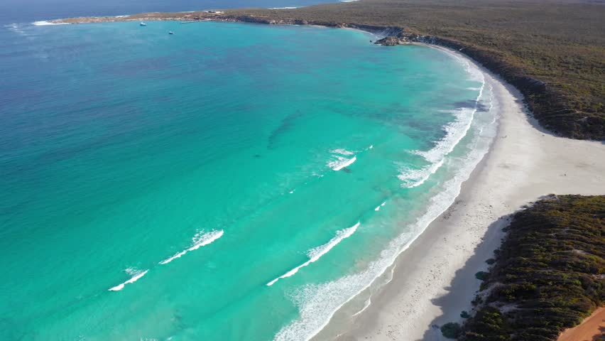 Drone orbit shot of turquoise waters and beach at Vivonne Bay, Kangaroo Island, South Australia