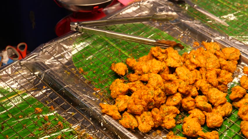 Deep-frying Fish cakes, street food, Thailand