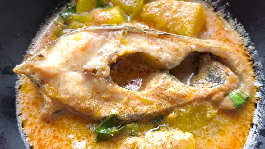 Fish and pumpkin curry in bowl, Thai traditional food