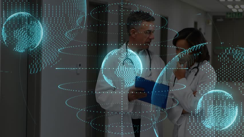 Holographic globes rotating around doctors reviewing chart on clipboard for health data analysis. Medical professionals, collaboration, digital technology, healthcare, data visualization, clinical - Powered by Shutterstock - Get 15% off with code: PIKWIZARD15