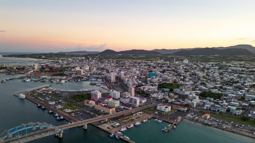 Ishigaki, Okinawa, Japan town skyline hyperlapse at golden hour.