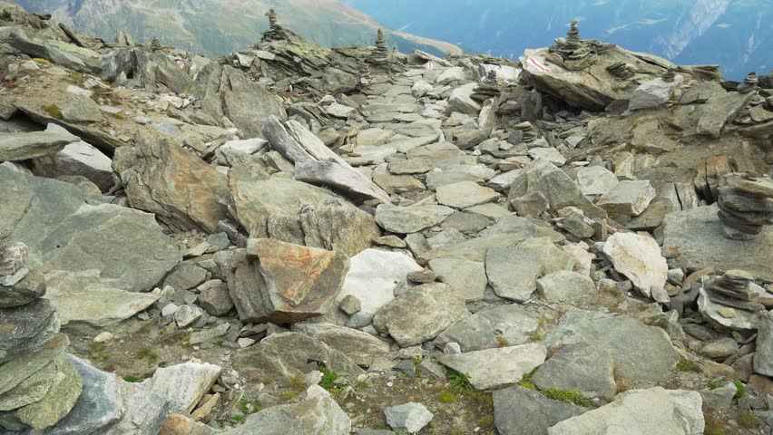 Scenic view with piles of rocks on the aletsch glacier mountain in Switzerland.