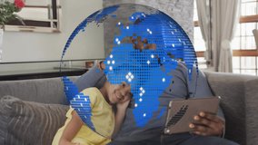 Father tapping tablet screen swiping to show daughter while transparent tech globe overlay growing. Family, technology, bonding, education, digital, relaxation, lifestyle - Powered by Shutterstock - Get 15% off with code: PIKWIZARD15