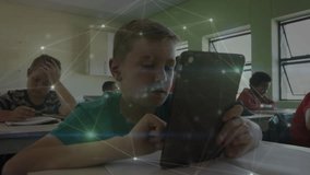 Schoolboy tapping tablet while network overlay appearing panning revealing classmates for education. Learning, technology, education, classroom, digital, youth, innovation - Powered by Shutterstock - Get 15% off with code: PIKWIZARD15