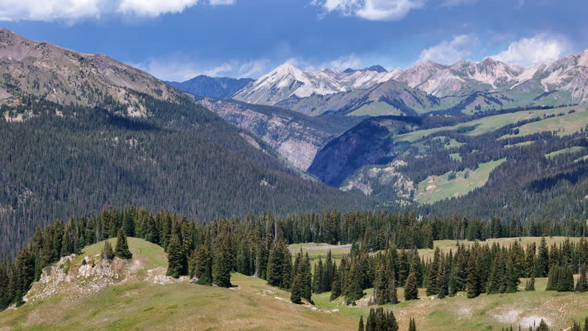 Aerial View of Elk Mountain Landscape on Sunny Summer Day, Colorado USA, Drone Shot