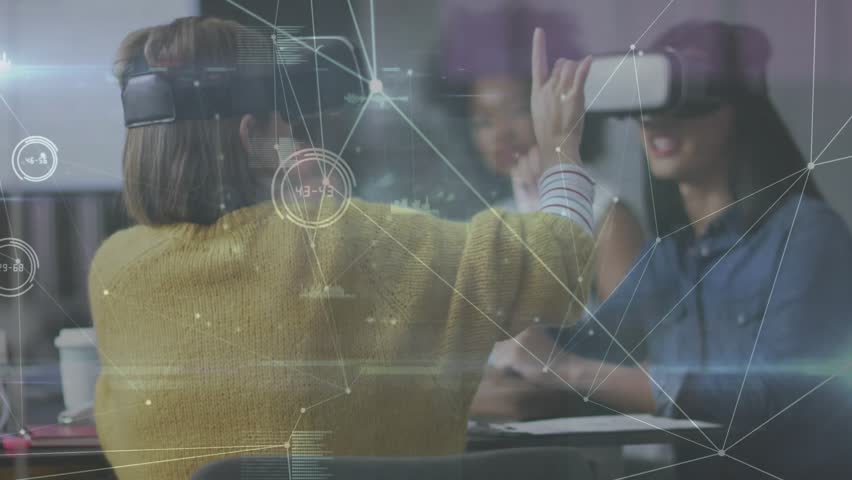 Technology team putting on VR headsets and exploring data network diagrams with colleague observing. Innovation, collaboration, futuristic, digital, immersive, enterprise, interaction - Powered by Shutterstock - Get 15% off with code: PIKWIZARD15