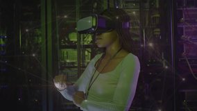 Engineer wearing VR headset in server room extending finger tapping pulsing network nodes testing. Technology, innovation, cybersecurity, digital, futuristic, data, immersive - Powered by Shutterstock - Get 15% off with code: PIKWIZARD15