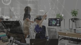 Woman arriving tech office putting on VR headset initiating holograms and analyzing charts. Futuristic, collaboration, innovation, digital, workspace, immersive, technology - Powered by Shutterstock - Get 15% off with code: PIKWIZARD15