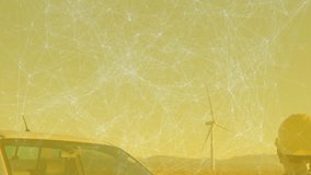 Male worker powering tablet on at wind farm tapping animated overlays checking turbine performance. Renewable energy, industrial, rural, technology, maintenance, sustainable, outdoor - Powered by Shutterstock - Get 15% off with code: PIKWIZARD15