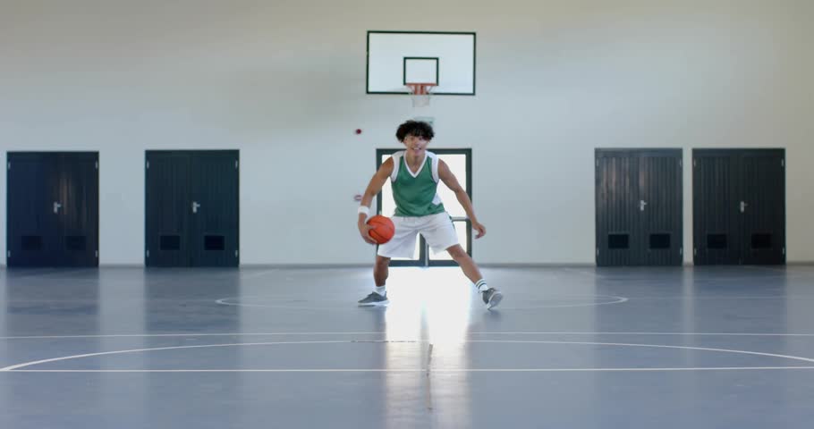 Basketball player dribbling at free-throw line, sparking neon light trails visualizing dribble path. Sports, athletics, motion, neon, energic, futuristic, vibrant