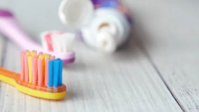 Colorful Children's Toothbrushes and Toothpaste 4k video - Powered by Shutterstock - Get 15% off with code: PIKWIZARD15