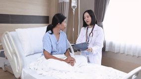 Hospital, healthcare, medical, doctor, nurse consults smiling patient at bedside, offering trust, comfort, and emotional support in clinical setting with compassionate care, quality services clinic - Powered by Shutterstock - Get 15% off with code: PIKWIZARD15