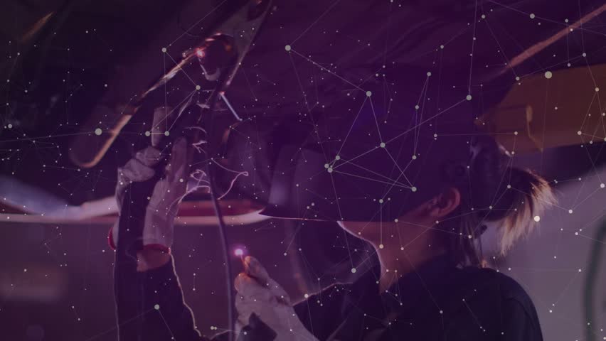 Engineer reaching gloved hand initiating data panels while inspecting metal part in robotics lab. Industrial, technology, futuristic, innovation, engineering, machinery, digital - Powered by Shutterstock - Get 15% off with code: PIKWIZARD15