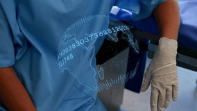 medical nurse placing gloved hand on chair armrest monitoring patient metrics on rotating globe. Healthcare, technology, innovation, professionalism, clinical, modern, data - Powered by Shutterstock - Get 15% off with code: PIKWIZARD15