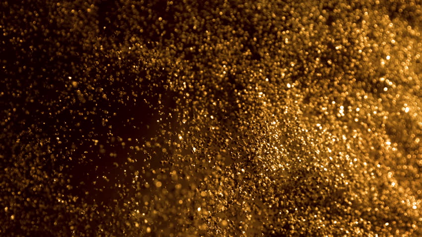 Super Slow Motion Shot of Glittering Golden Background at 1000fps.