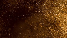 Super Slow Motion Shot of Glittering Golden Background at 1000fps. - Powered by Shutterstock - Get 15% off with code: PIKWIZARD15
