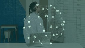 Doctor selecting marker updating patient schedule while hologram rotating and nurse viewing laptop. Healthcare, technology, collaboration, innovation, medical, digital, professionalism - Powered by Shutterstock - Get 15% off with code: PIKWIZARD15