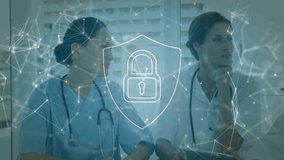 Nurse tapping tablet after padlock pulsing on overlay while medical team reviewing patient data. Collaboration, healthcare, digital, professionalism, teamwork, innovation, clinical - Powered by Shutterstock - Get 15% off with code: PIKWIZARD15