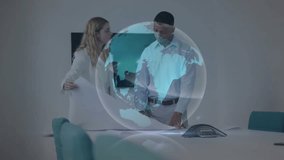 Colleagues tapping desk launching 3D globe rotating with light streams flowing visualizing data. Futuristic, innovation, collaboration, technology, digital, networking, corporate - Powered by Shutterstock - Get 15% off with code: PIKWIZARD15