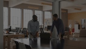 Colleagues placing laptop on table and activating glowing network overlay for business insights. Collaboration, data visualization, digital connection, professional, technology, teamwork, innovation - Powered by Shutterstock - Get 15% off with code: PIKWIZARD15