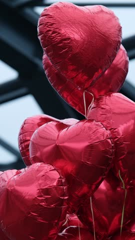 Tied Red Heart-Shaped Balloons Symbolize Love And Romance, Vertical Video