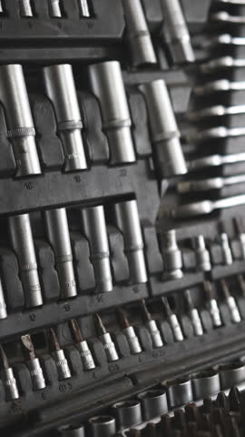 Wrench Set And Tools At An Auto Mechanic's Workplace In The Garage, Vertical Video