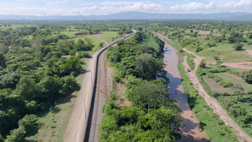 Drone view of Border fence between the Dominican Republic and Haiti from the Dajabon area, Dominican Republic