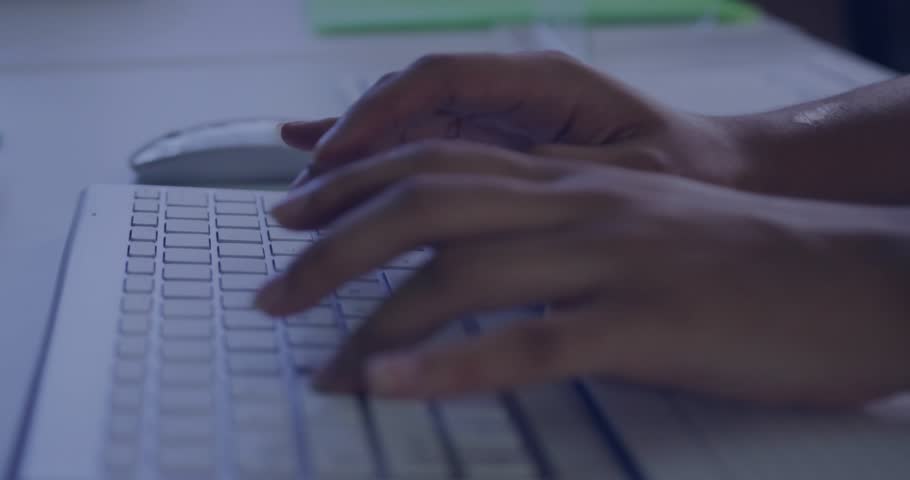 Woman typing on laptop at desk initiating circuitry overlay glowing around lock icon for encryption. Cybersecurity, encryption, data protection, digital network, technology, innovation, professional