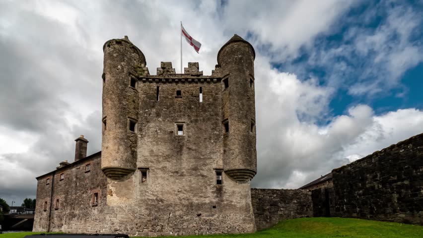 Enniskillen Castle is standing on the banks of Lough Erne in Northern Ireland. Dramatic clouds. Timelape