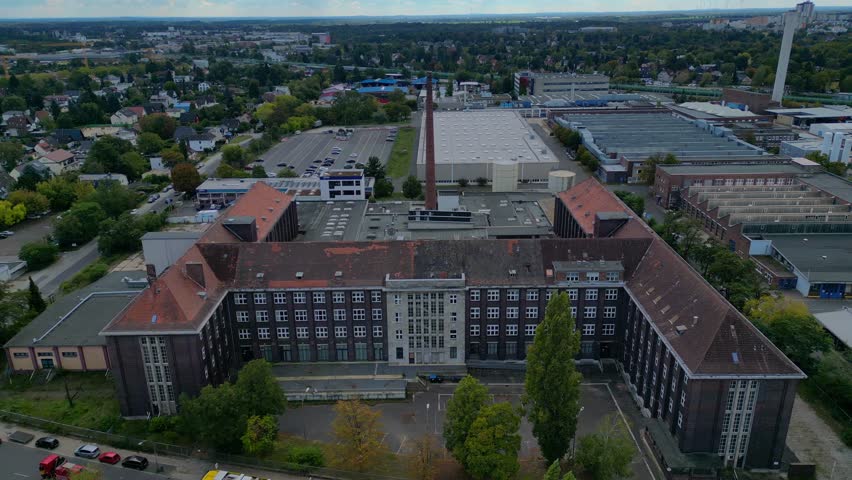 Berlin Mercedes-Benz oldest production plant. Smooth aerial view flight drone