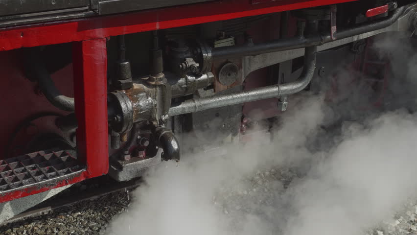 View of working steam and valves of a steam locomotive.