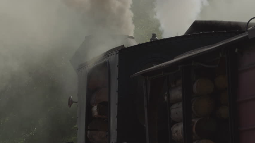 Thick smoke produced by a steam locomotive.