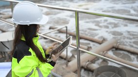 Engineer inspecting wastewater treatment plant and recording data for environmental monitoring. Concept of water management, industrial inspection, and sustainability process. - Powered by Shutterstock - Get 15% off with code: PIKWIZARD15