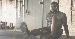 Fitness athlete using foam roller initiating hamstring rolling for relief with gold sparkle overlay. Athletic, recovery, flexibility, strength, wellness, training, dynamic - Powered by Shutterstock - Get 15% off with code: PIKWIZARD15