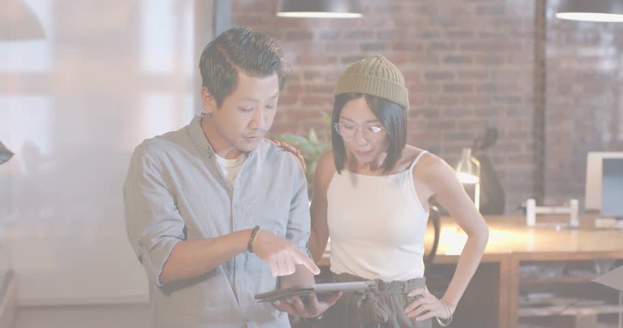 Two coworkers tapping tablet and nodding, explaining cloud, CLOUD text fading and outline tracing. Collaboration, teamwork, innovation, digital, modern, brainstorming, technology