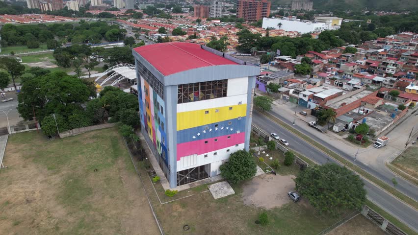 Aerial view of colorful building by Parque Agustín Codazzi in Aragua