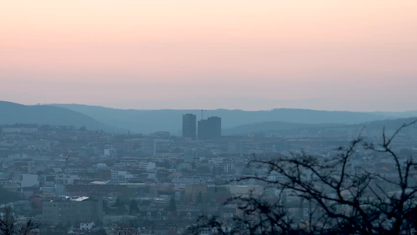 Brno, Czech Republic - March 29, 2025: View of the city from above at night. Evening city panorama. Špilberk Castle.