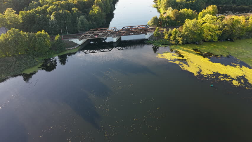 BYDGOSZCZ, POLAND - 28 SEP 2025: Aerial Bydgoszcz Poland Brda River railroad bridge. Historic population center. River Brda inland waterway, tributary of Vistula. Historical trade and transportation.