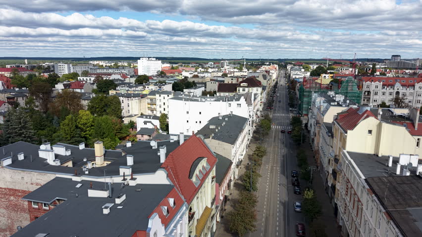 BYDGOSZCZ, POLAND - 28 SEP 2025: Aerial Bydgoszcz Poland city street buildings traffic. Historic population center, narrow streets. Modern architecture and high rise apartments.