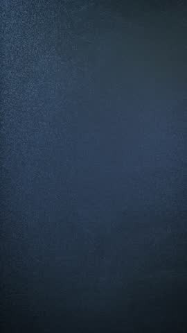 Hand writing Bitcoin and drawing line showing increase. Word bitcoin written on chalkboard. Bitcoin drawn on blackboard in chalk. Vertical video