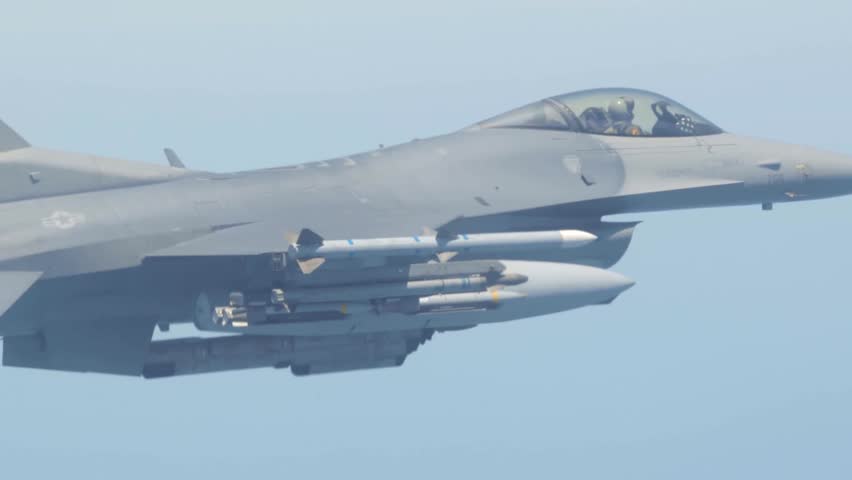An F-16 Fighting Falcon from the 36th Fighter Squadron of the 51st Operations Group of the U.S. Air Force at Osan Air Base, South Korea drops a new weapon, the GBU39, on May 21, 2015. OSAN AIR BASE, 