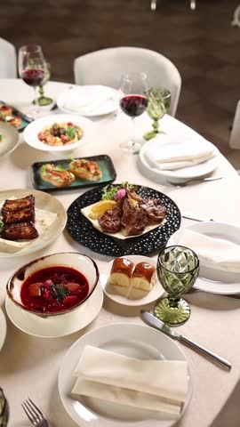 Festive banquet table in a restaurant. Served with delicious dishes. 