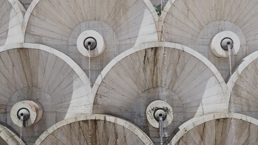 Yerevan, Cascade. An architectural and landscape structure. Water flows from an artificial waterfall, round shapes made of tuff