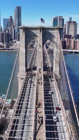 Brooklyn Bridge At Manhattan In New York United States. Highrise Buildings Scenery. Cable Bridge Landscape. Brooklyn Bridge At New York United States. Downtown Cityscape.