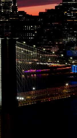 Brooklyn Bridge At Manhattan In New York United States. Highrise Buildings Landscape. Colorful Sunset. Brooklyn Bridge At New York United States. Stunning Cityscape.
